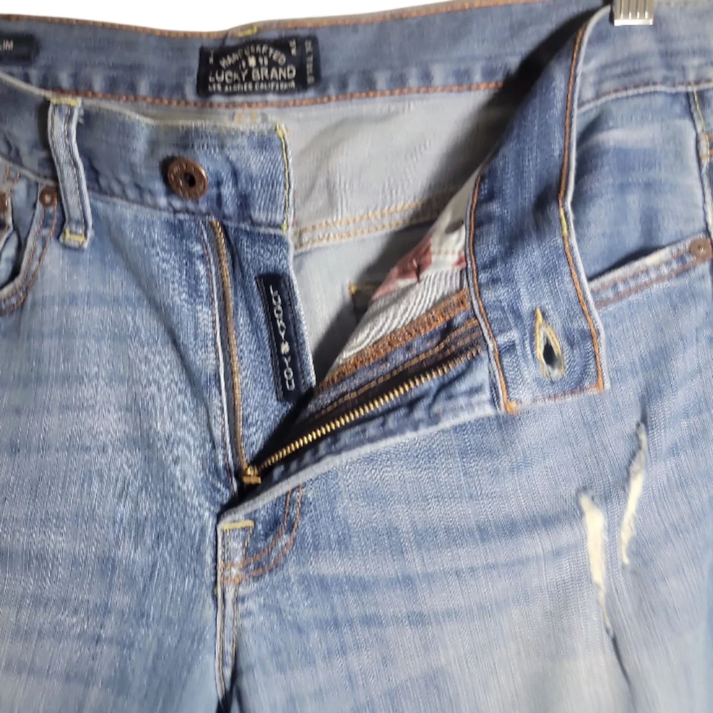Lucky Brand men's 121 heritage slim distress blue jeans size 34/ 32